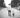 man walking down the street with a child