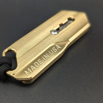 Brass utility knife made for every day carry and ergonomic use