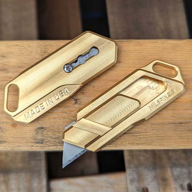 Brass utility knife made for every day carry and ergonomic use