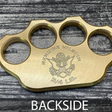 backside of American-made brass knuckles stamped with MILSPIN logo