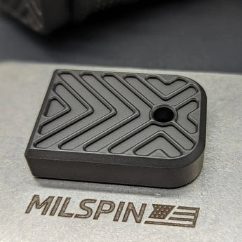 Glock 43X-compatible X-Carve base plate above MILSPIN logo