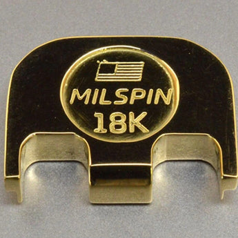 gold Glock slide plate stamped with “MILSPIN 18K”