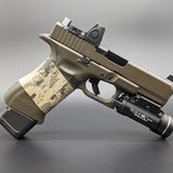 side view of Glock with custom attachments